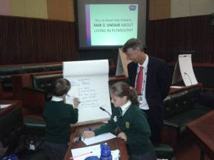 Head of Lipson Co-operative Academy guides some of the children in presenting their ideas