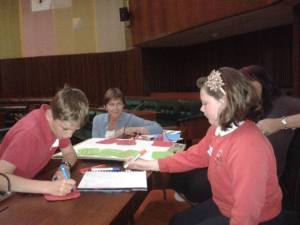Chair Suzi Leather works with some of the students to come up with their views on fairness